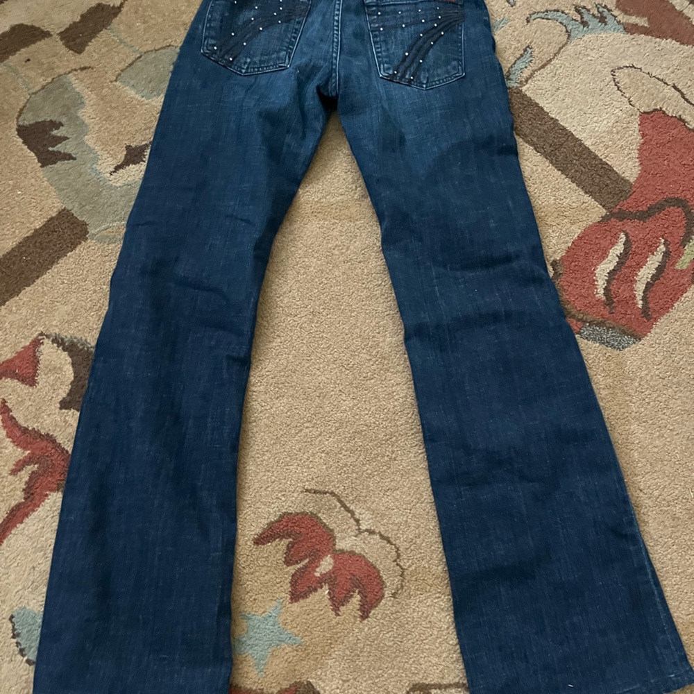 Seven for all mankind!